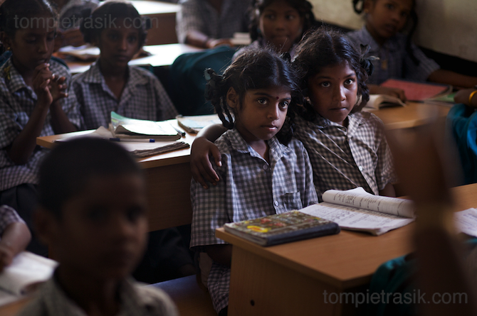Pupils at Thalanguda government school listen to their teacher. Tamil Nadu, India © Tom Pietrasik 2008